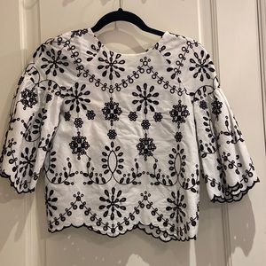 White blouse with cut outs
